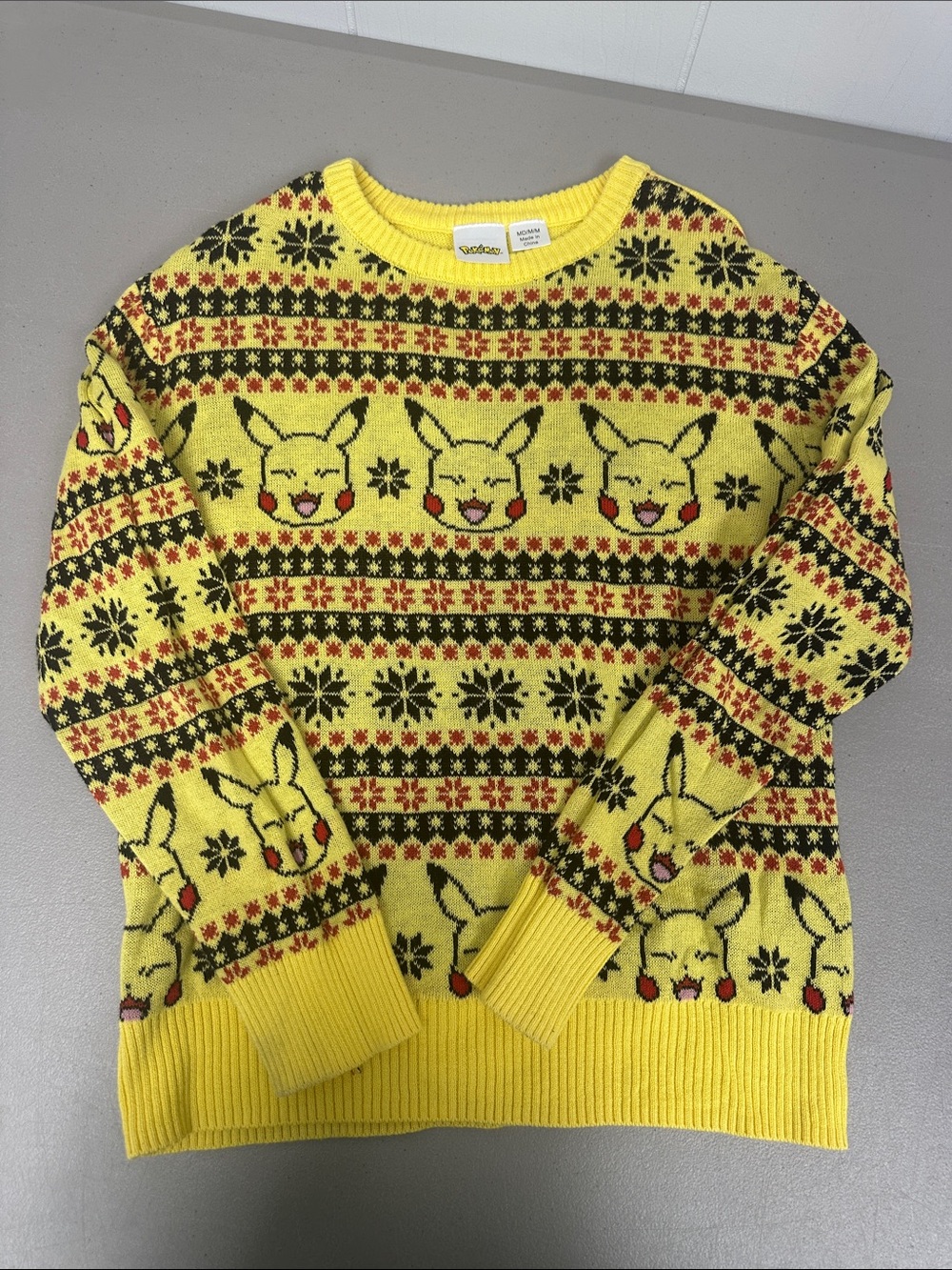 Boys size medium (8/10) Pokémon Pikachu Yellow winter themed Sweater